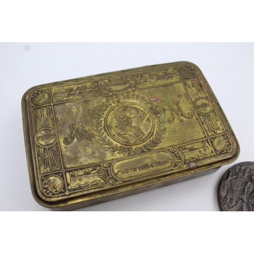 340 - A WWI brass Princess Mary Christmas tin with R.M.S Lusitania medal