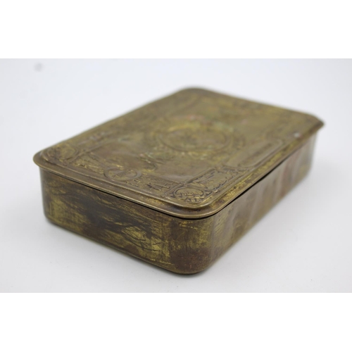 340 - A WWI brass Princess Mary Christmas tin with R.M.S Lusitania medal