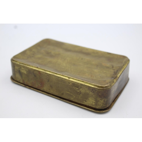 340 - A WWI brass Princess Mary Christmas tin with R.M.S Lusitania medal