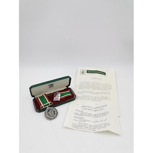 343A - A boxed Women's Voluntary Service Medal