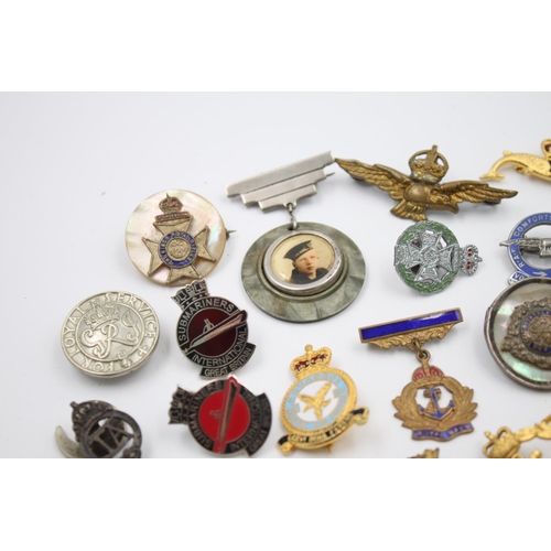 347 - Twenty assorted vintage military lapel/sweetheart badges to include R.A.F, Navy, Army etc.