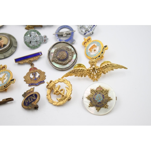 347 - Twenty assorted vintage military lapel/sweetheart badges to include R.A.F, Navy, Army etc.