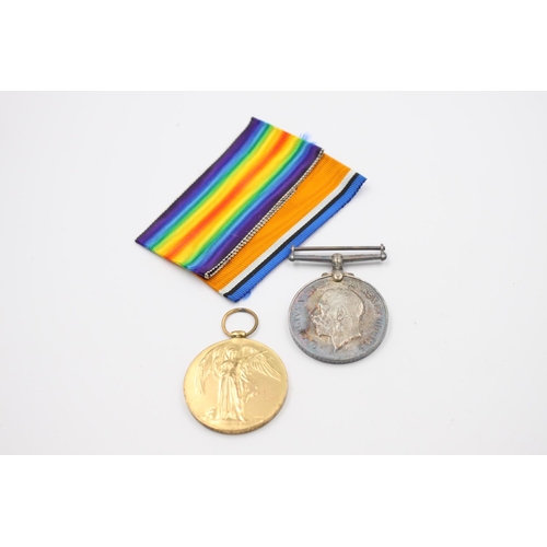 351 - A boxed WWI medal pair with packets and ribbons presented to M-348313 Pte. W. Morton A.S.C