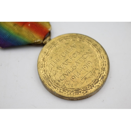 354 - A WWI medal pair with original ribbons presented to 32537 Pte. T. Taylor of the Manchester Regiment