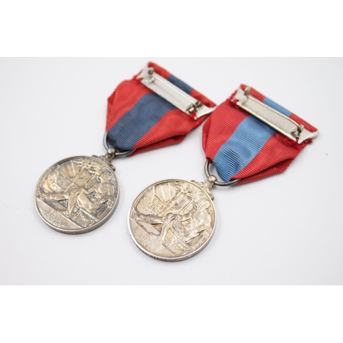 357 - Two boxed ERII Imperial Service medals presented to Gladys Violet Finch and Edith Vera Norris