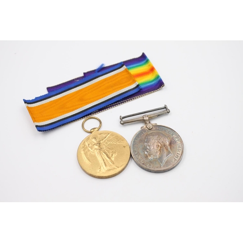 360 - A boxed WWI medal pair with box, pockets and ribbons presented To 175936 GNR P.Low R.A