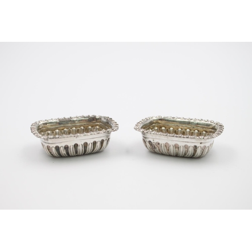 386 - Three assorted hallmarked sterling silver condiment dishes - approx. gross weight 43 grams