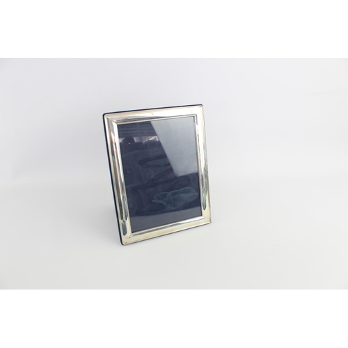 389 - A boxed hallmarked Sheffield silver photo frame by Carrs of Sheffield, dated 2001 - approx. 24cm x 1... 