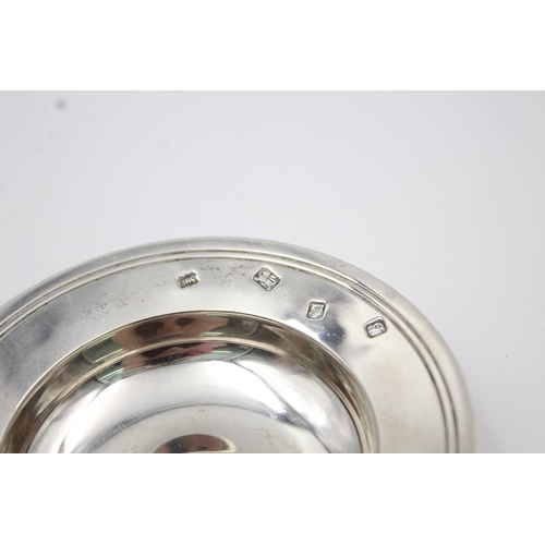 394 - A hallmarked London silver trinket dish, dated 1971 - approx. gross weight 63 grams and 9.5cm diamet... 