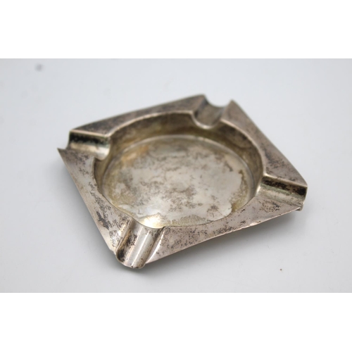 397 - Two hallmarked sterling silver items, one cigar cutter and one ashtray - approx. gross weight 39 gra... 