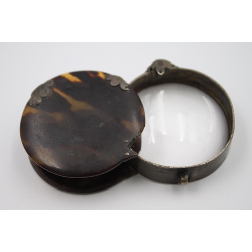 399 - A 19th century tortoiseshell and .925 silver magnifying glass - approx. gross weight 59 grams