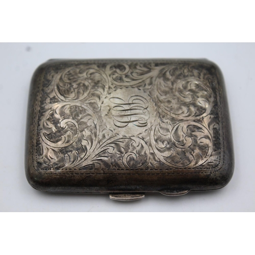 403 - A George V hallmarked Birmingham silver cigarette case, dated 1921 - approx. gross weight 51 grams a... 