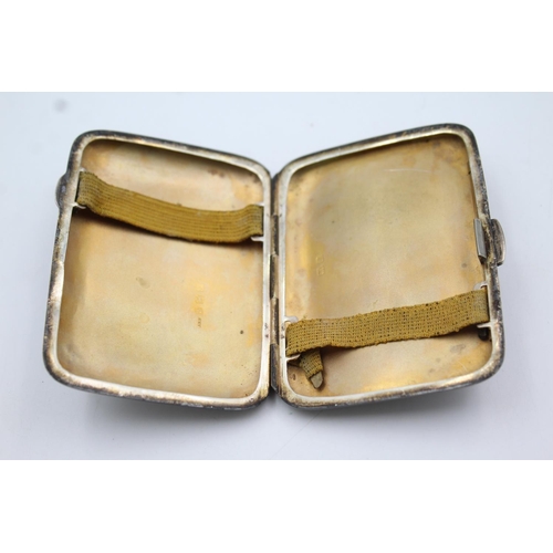 403 - A George V hallmarked Birmingham silver cigarette case, dated 1921 - approx. gross weight 51 grams a... 