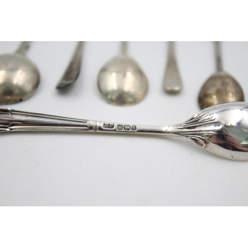 409 - Twelve assorted hallmarked sterling silver condiment spoons - approx. gross weight 53 grams