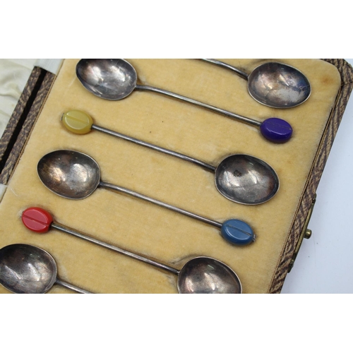 411 - A cased set of six Art Deco hallmarked Birmingham silver coffee bean spoons, dated 1935 - approx. gr... 