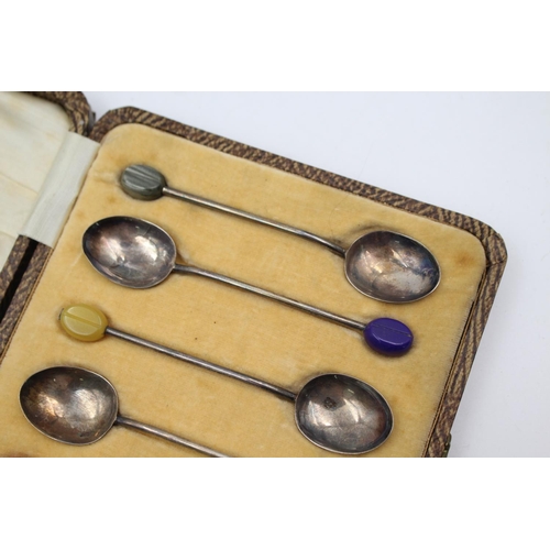 411 - A cased set of six Art Deco hallmarked Birmingham silver coffee bean spoons, dated 1935 - approx. gr... 