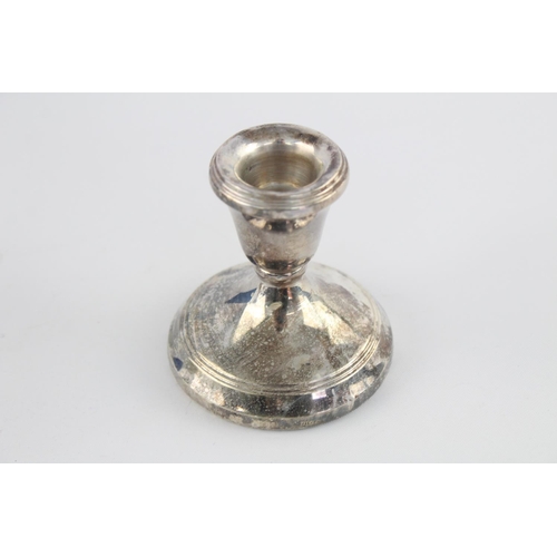 416 - Two hallmarked Birmingham silver squat filled candlesticks, dated 1988 - approx. 7.5cm high