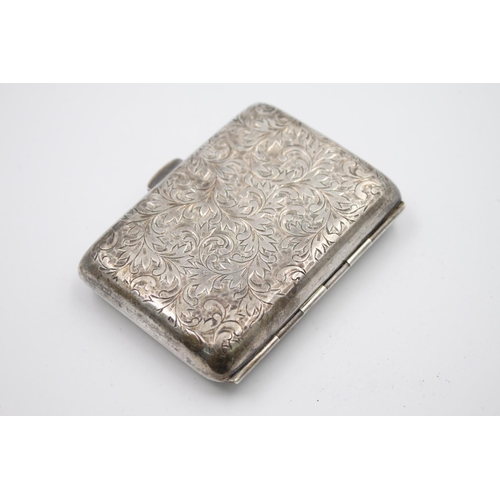 419 - A stamped .950 silver cigarette case with scrolling leaf engraving - approx. gross weight 65 grams a... 