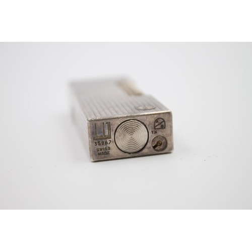 430 - A Dunhill silver plated cigarette lighter