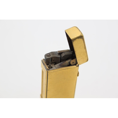 431 - A Dunhill gold plated Rollagas cigarette lighter