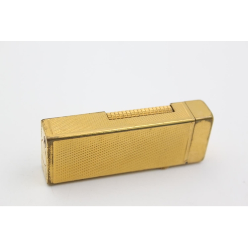 431 - A Dunhill gold plated Rollagas cigarette lighter