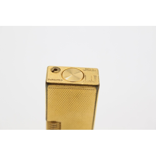 431 - A Dunhill gold plated Rollagas cigarette lighter