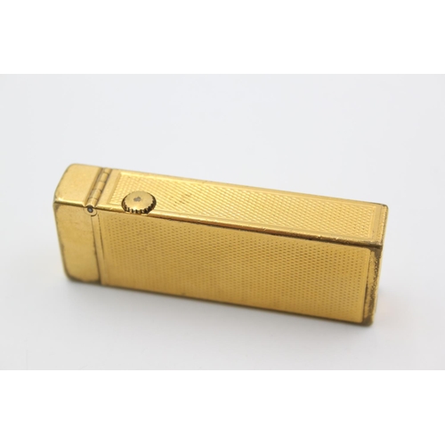 431 - A Dunhill gold plated Rollagas cigarette lighter