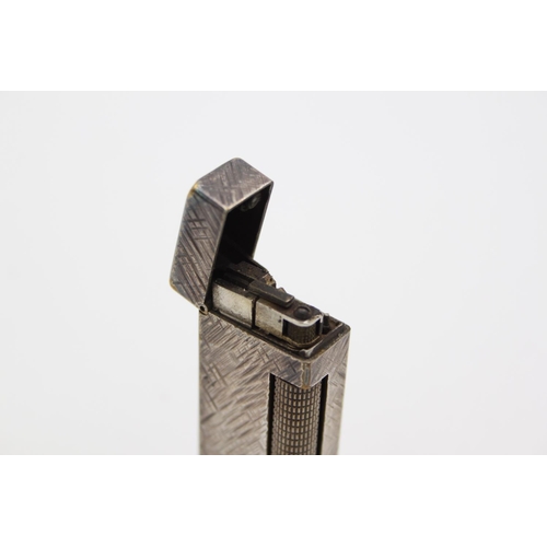 433 - A Dunhill silver plated Rollagas cigarette lighter