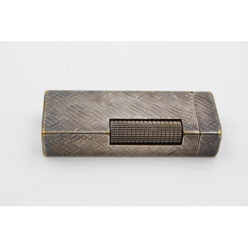 433 - A Dunhill silver plated Rollagas cigarette lighter