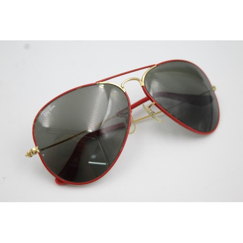 450 - A pair of Bausch & Lomb Ray-Ban red framed Aviator sunglasses with case