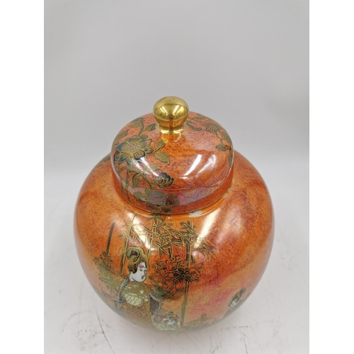 485 - An Art Deco A. G. Harley Jones Wilton Ware orange lustre ginger jar and cover with oriental design, ... 