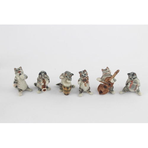 508 - A collection of assorted ceramic animal figurines to include Delft Ware duck, Wade Whimsies etc.