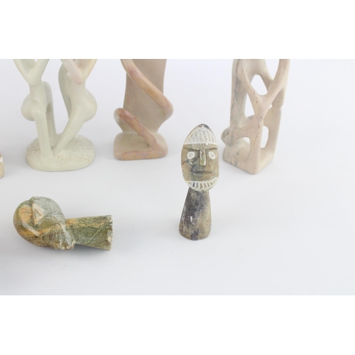 510 - A collection of assorted polished stone and gemstone figurines to include soapstone, alabaster etc.