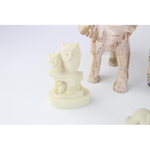 510 - A collection of assorted polished stone and gemstone figurines to include soapstone, alabaster etc.