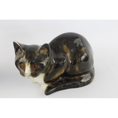 513 - Two 1980s Mike Hinton Winstanley pottery cats with glass eyes