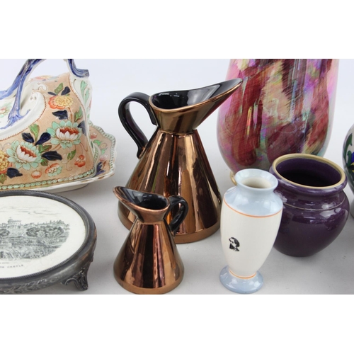 516 - A collection of assorted ceramics to include two Beswick copper lustre ware graduating jugs - ref no... 