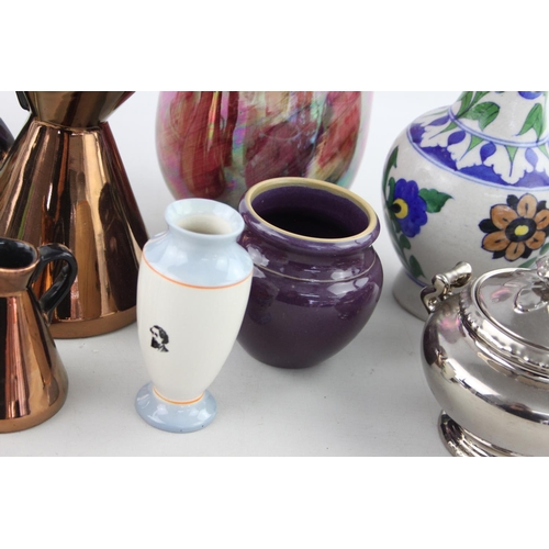 516 - A collection of assorted ceramics to include two Beswick copper lustre ware graduating jugs - ref no... 