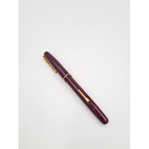 331 - Four assorted vintage writing instruments to include boxed Waterman's fountain pen with with 14ct go... 