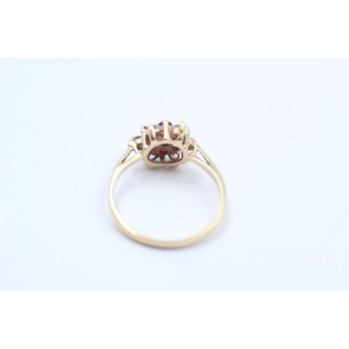 113 - A hallmarked London 9ct gold ruby and gemstone cluster ring dated 1984, size O ½ - approx. gross wei... 