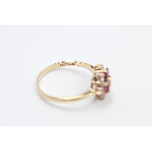 113 - A hallmarked London 9ct gold ruby and gemstone cluster ring dated 1984, size O ½ - approx. gross wei... 