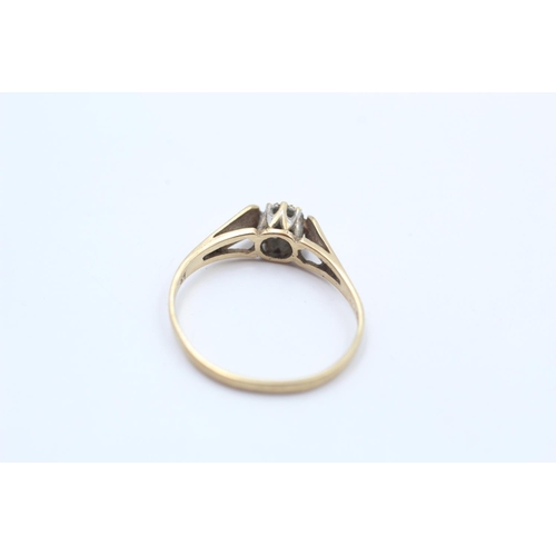 116 - A hallmarked Birmingham 9ct gold diamond solitaire ring, size Q ½ - approx. gross weight 1.5 grams