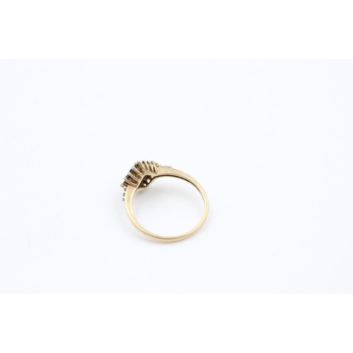 118 - A hallmarked London 9ct gold black and white diamond cluster ring, size P ½ - approx. gross weight 2... 