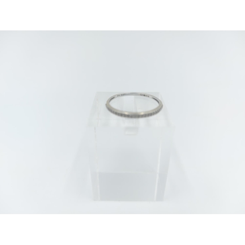 123 - A hallmarked London 9ct white gold 0.07ct diamond half eternity ring, size K - approx. gross weight ... 