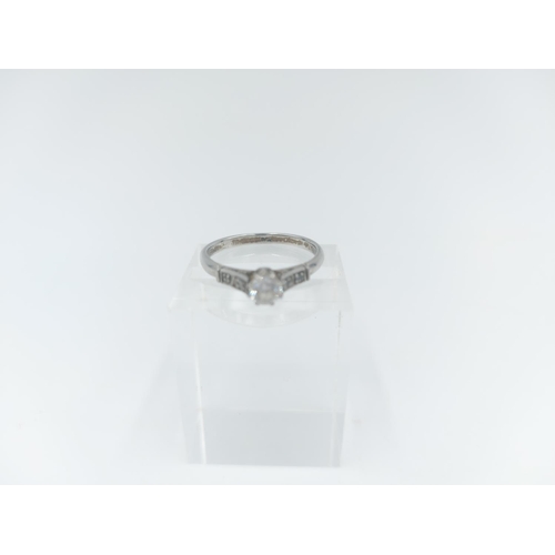 122 - A platinum diamond solitaire ring, size O ½ - approx. gross weight 2.16 grams