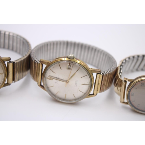 138 - Four assorted gold tone hand wind and automatic gents wristwatches to include Limit