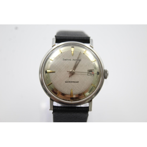 164 - A vintage Smiths Astral hand wind gents wristwatch with silvered dial and black strap - made in Engl... 