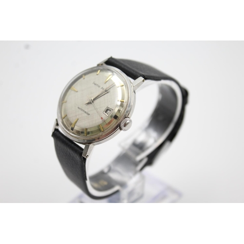 164 - A vintage Smiths Astral hand wind gents wristwatch with silvered dial and black strap - made in Engl... 