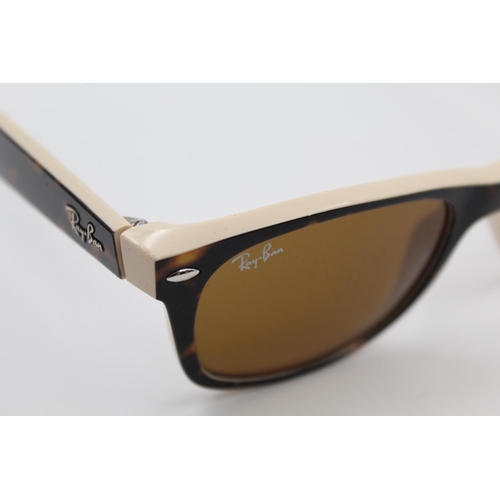 173 - A pair of Ray-Ban tortoiseshell effect New Wayfarer classic ladies sunglasses with case