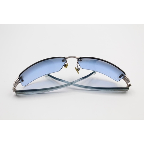 175 - A pair of Versace 00s style blue tint frameless ladies statement sunglasses with case