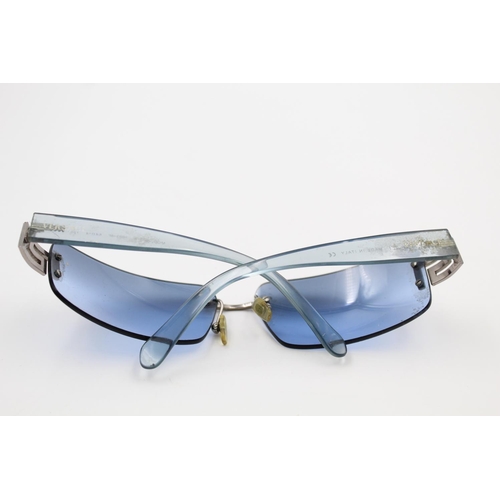 175 - A pair of Versace 00s style blue tint frameless ladies statement sunglasses with case